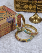 Bahar Jadau Bangles Set With Navratan Stones