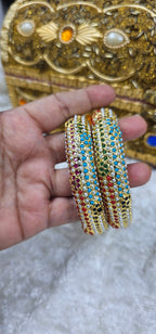 Bahar Jadau Bangles Set With Navratan Stones