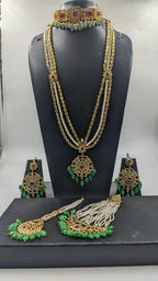 Kehkashan Bridal Set in Ruby- emerald