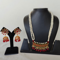 Tirmani in with Jhumka in Real Ruby n Real Pearls