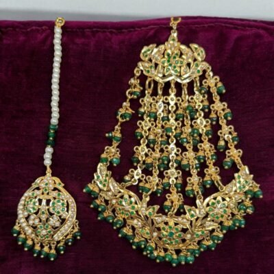 Close-up view of Gauhar Jhumar-Tika with Navratan design