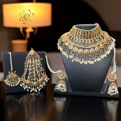 Bridal jewellery set featuring jhumki sahare and tika